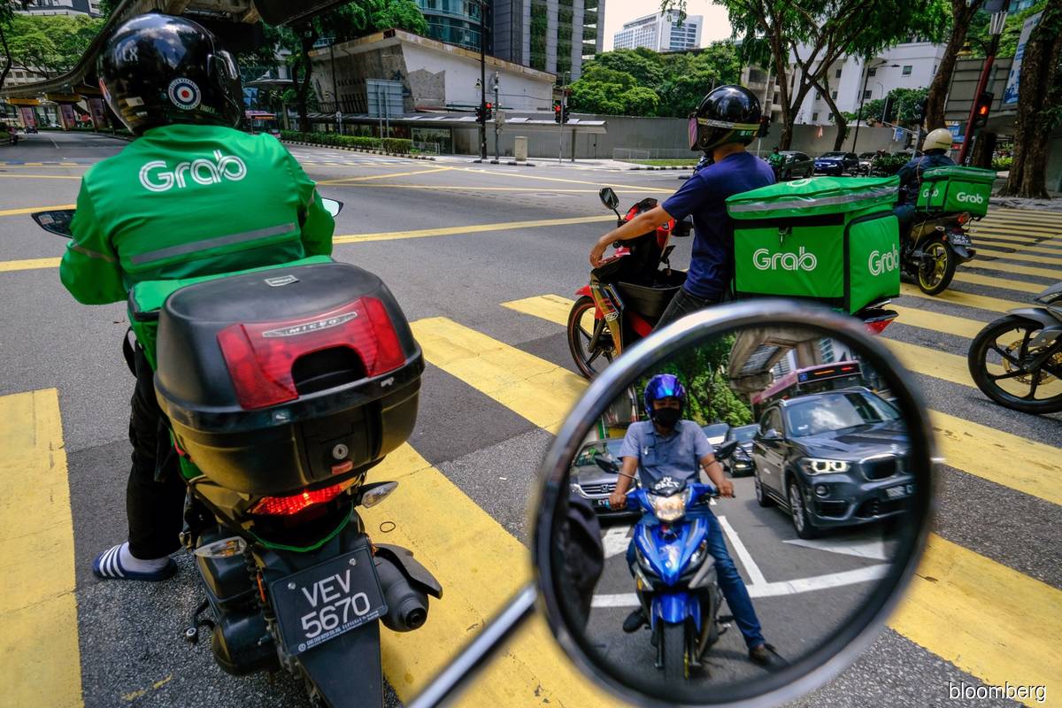 Grab heads for public market after investors approved SPAC merger
